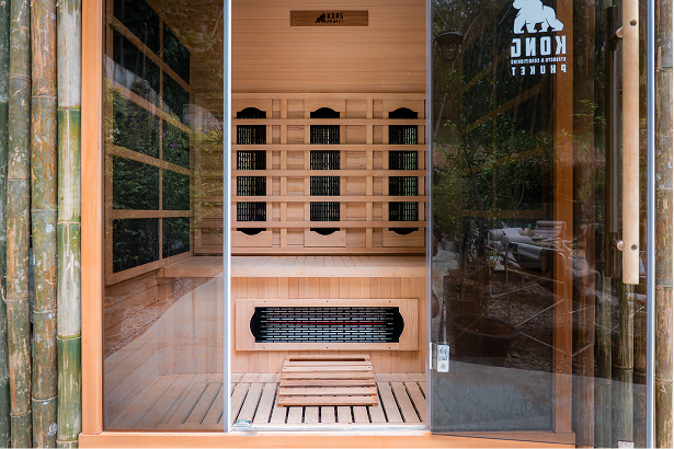 Infrared sauna interior with KONG branding